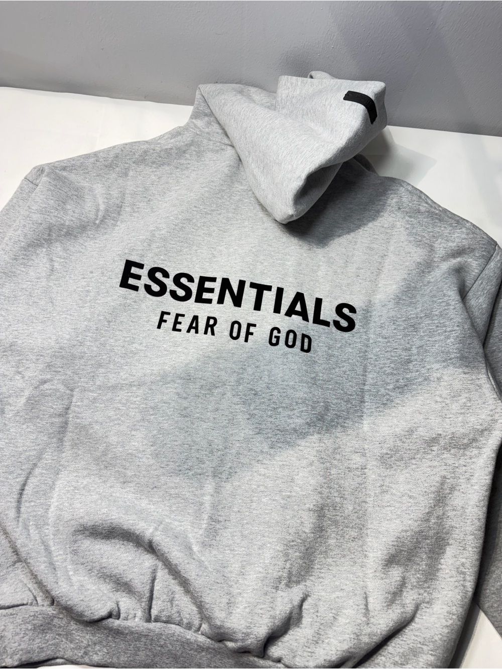 Essentials Light Gray Hoodie with Black Logo